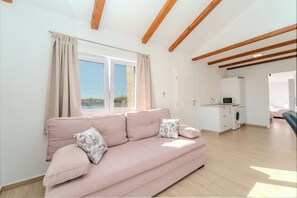 Comfort-Apartment, Meerblick | Wohnzimmer