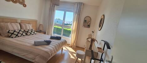 1 bedroom, desk, iron/ironing board, travel cot