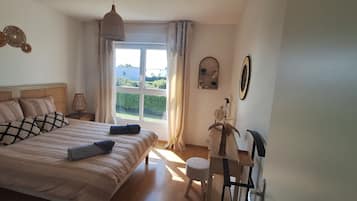 1 bedroom, desk, iron/ironing board, travel crib