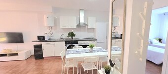 Apartment with garden and pool Isla Sol 5909