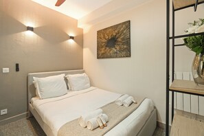 Blackout drapes, iron/ironing board, travel crib, free WiFi