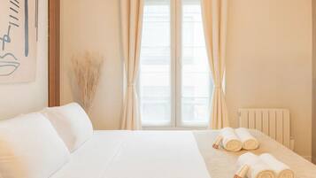 Blackout drapes, iron/ironing board, travel crib, free WiFi