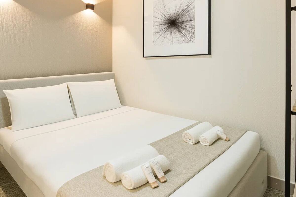 Blackout drapes, iron/ironing board, travel crib, free WiFi