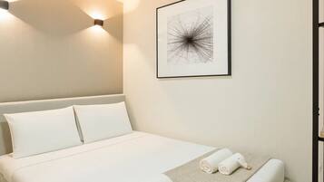 Blackout drapes, iron/ironing board, travel crib, free WiFi