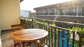 Junior Suite, Balcony, Pool View | Balcony