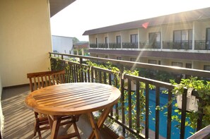 Junior Suite, Balcony, Pool View | Balcony