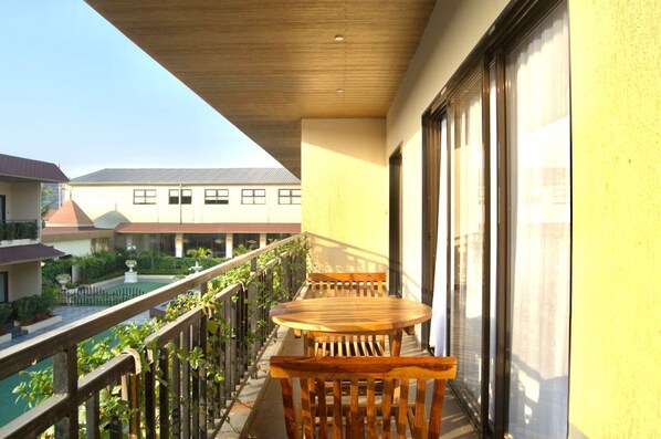 Junior Suite, Balcony, Pool View | Balcony - Prana Resorts and Banquets (Pune)