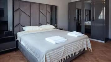 Suíte júnior | Ferros/tábuas de passar roupa, Wi-Fi de cortesia