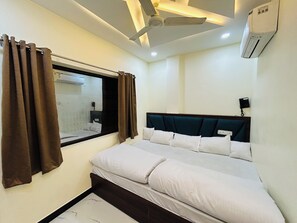 Kolmen hengen deluxe-huone | Ilmainen Wi-Fi