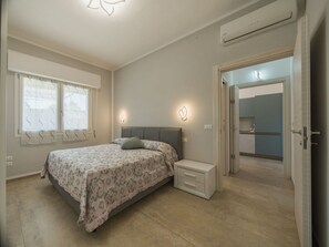 2 quartos, berço de viagem, Wi-Fi de cortesia, roupa de cama