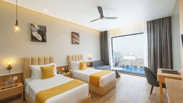 Executive Twin Room, Pool View | In-room safe, laptop workspace, blackout curtains, soundproofing