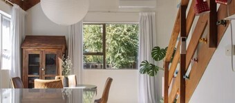 A classic 1970s Kiwi Bach designed by Chaplin's Architects
