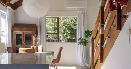 A classic 1970s Kiwi Bach designed by Chaplin's Architects