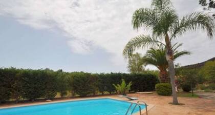 A lovely villa with swimming pool, located between the hills, river and the sea.