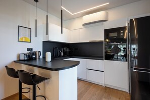 Apartment, 2 Bedrooms, Kitchen, City View | Private kitchen | Full-size fridge, microwave, oven, stovetop