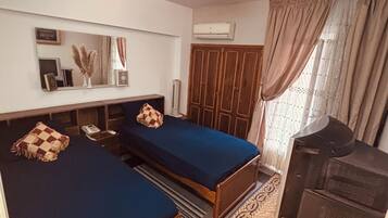 2 habitaciones, tabla de planchar con plancha y wifi gratis