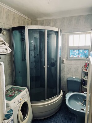 Hair dryer, towels, soap, toilet paper