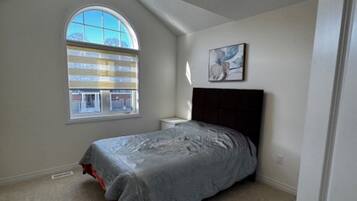 Classic Townhome, 3 Bedrooms, Kitchen, Courtyard View | 3 bedrooms, desk, laptop workspace, iron/ironing board