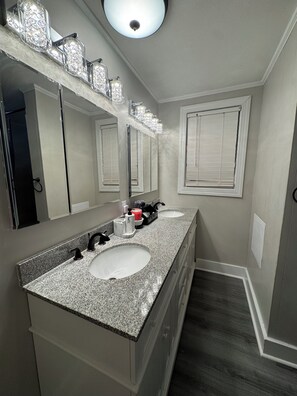 Shower, towels, soap, toilet paper