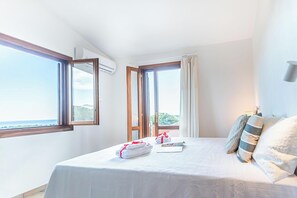 Family Apartment, Multiple Bedrooms, Refrigerator & Microwave (House Sardinia La Dolce Vita) | 2 bedrooms, laptop workspace, free WiFi, bed sheets