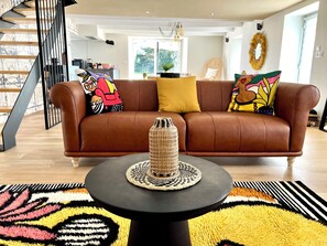 TV, fireplace, books