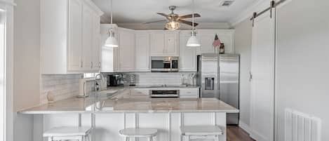 Fridge, microwave, dishwasher, coffee/tea maker