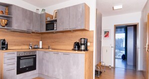 Fridge, microwave, dishwasher, coffee/tea maker
