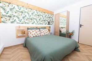 2 bedrooms, iron/ironing board, travel crib, bed sheets