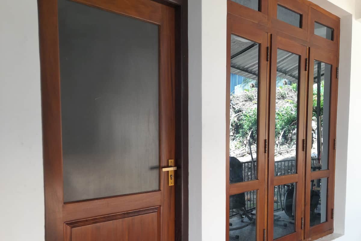 Family Triple Room, Garden View | Memory foam beds, free WiFi, bed sheets