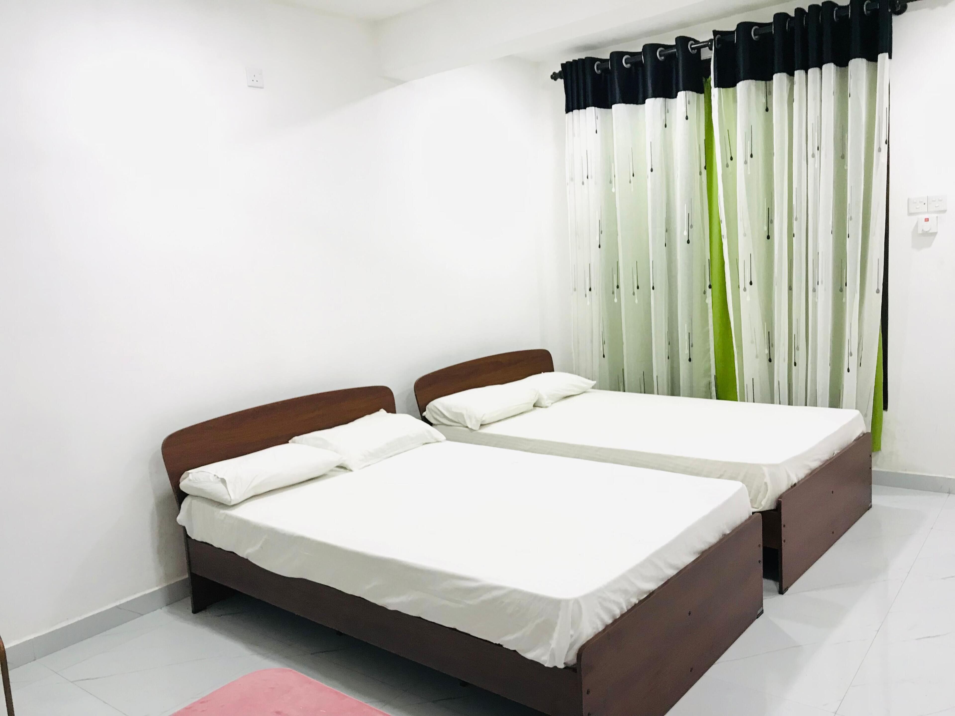 Familien-Dreibettzimmer, Gartenblick