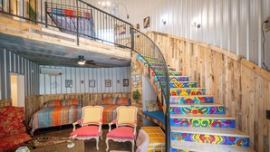 Interior - Sleeps 6 in a 2-story grain bins 2 queen beds 1 queen bunk & 2 full bathrooms. (Hermann)
