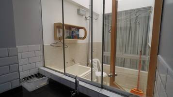 Shower, towels, soap, toilet paper