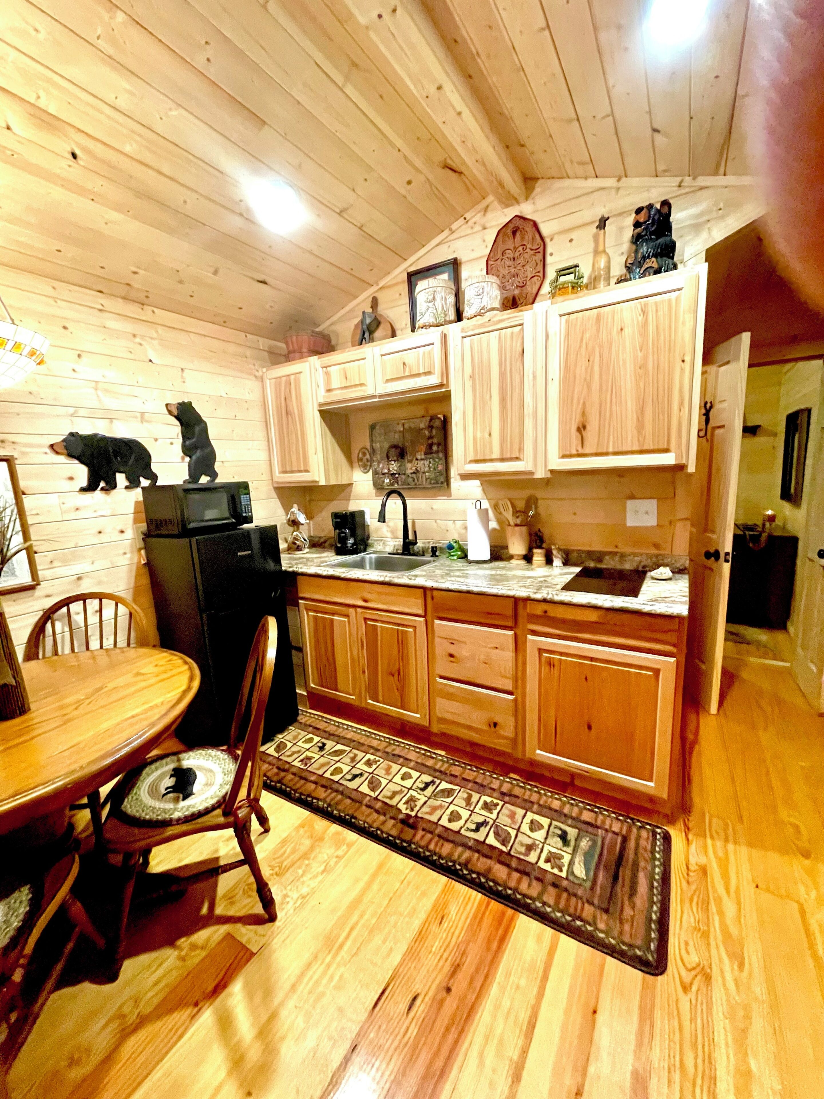 Fridge, microwave, stovetop, coffee/tea maker