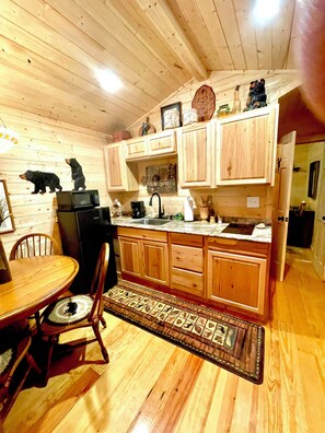 Fridge, microwave, stovetop, coffee/tea maker