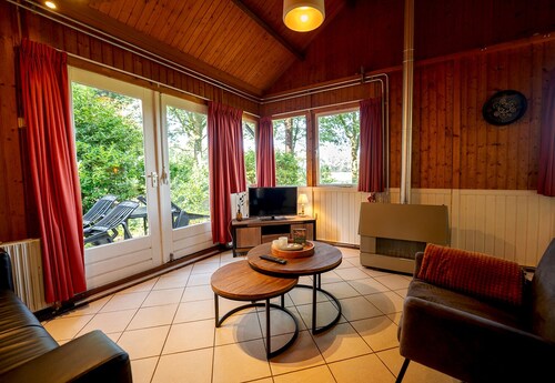 Cozy summer cottage in forest and overlooking meadow