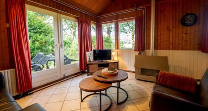 Cozy summer cottage in forest and overlooking meadow