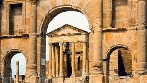 An ancient stone structure with multiple arches and columns. - Sufetula Hotel (Sbeitla)