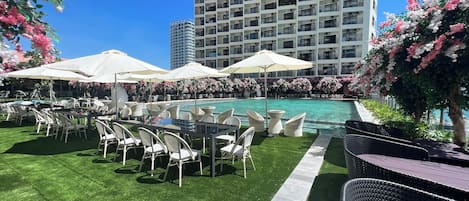 Outdoor pool, open 7:00 AM to 5:00 PM, pool umbrellas, pool loungers