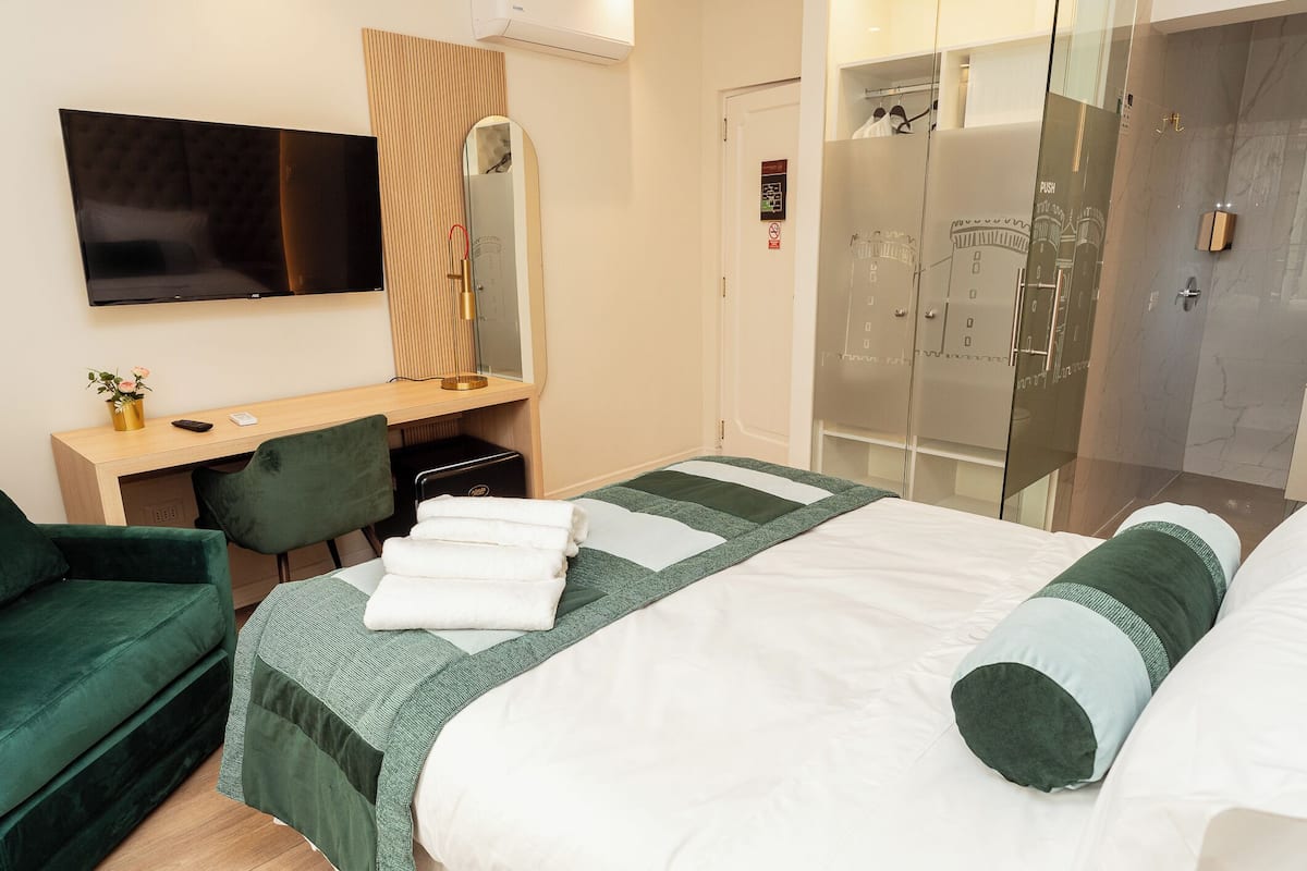 Superior Room, Balcony, Park View | In-room safe, desk, laptop workspace, blackout drapes