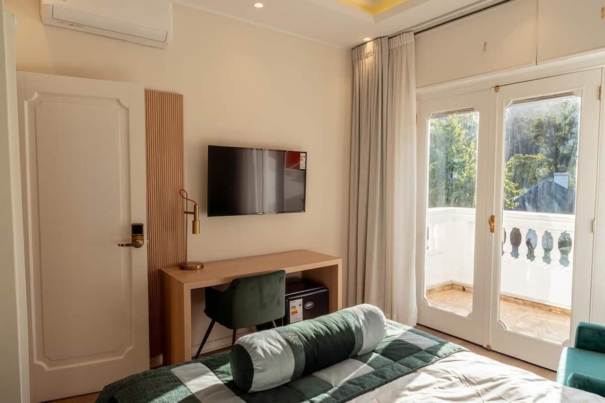 In-room safe, desk, laptop workspace, blackout curtains