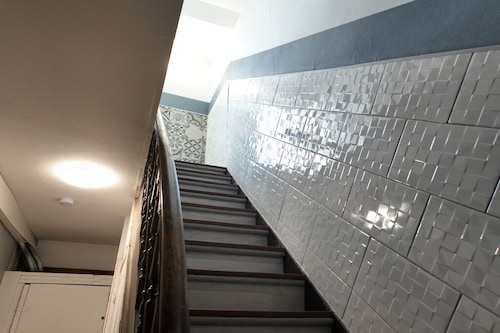 Bright city apartment with 2 private indoor parking spaces