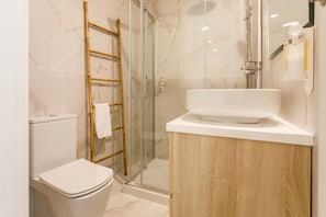 Hair dryer, towels, soap, toilet paper