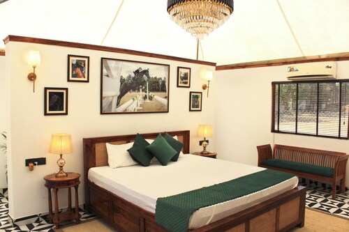  Aravali farm stay with horses offers a unique getaway amidst nature and horses.