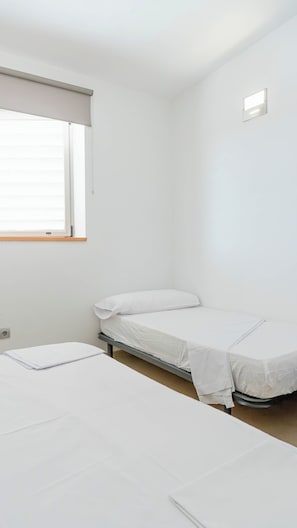 Quarto quádruplo superior | Wi-Fi de cortesia, roupa de cama