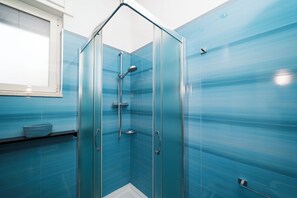 Shower, bidet, toilet paper