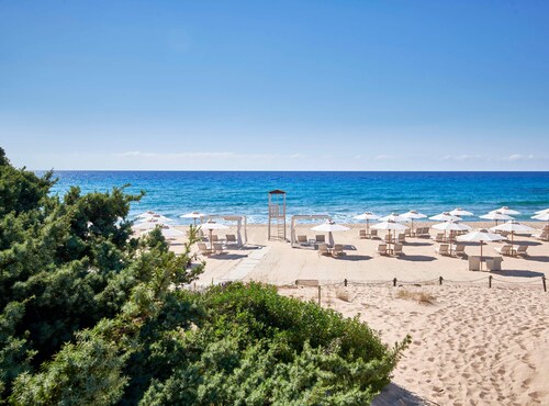 Baia di Chia Resort Sardinia, Curio Collection