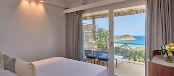 Baia Chia Laguna Resort, Curio Collection by Hilton