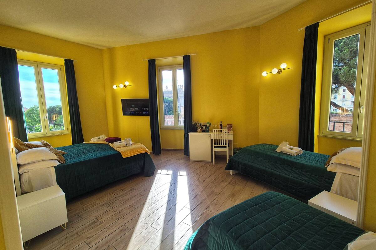 Luxury Quadruple Room, City View | 1 bedroom, premium bedding, memory foam beds, free minibar