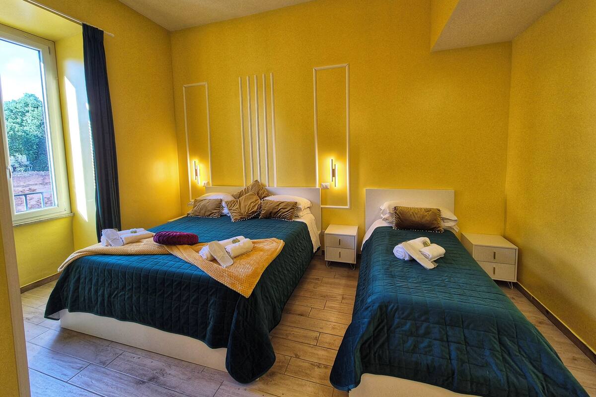 Deluxe Triple Room, City View | 1 bedroom, premium bedding, memory foam beds, free minibar