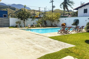 Outdoor pool, pool umbrellas, sun loungers